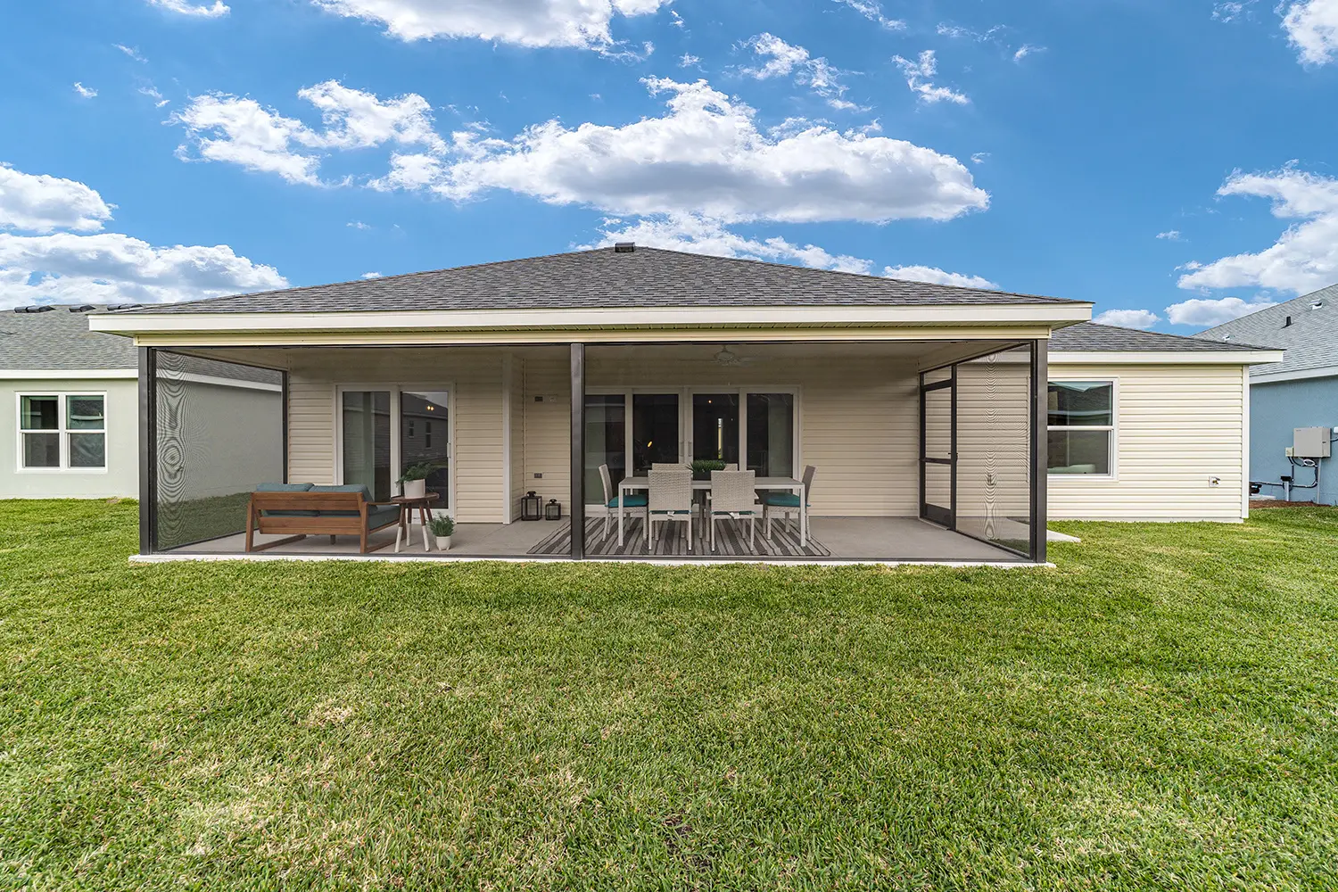 designer-whispering-pine-street-of-dreams-exterior-rear-lanai-1