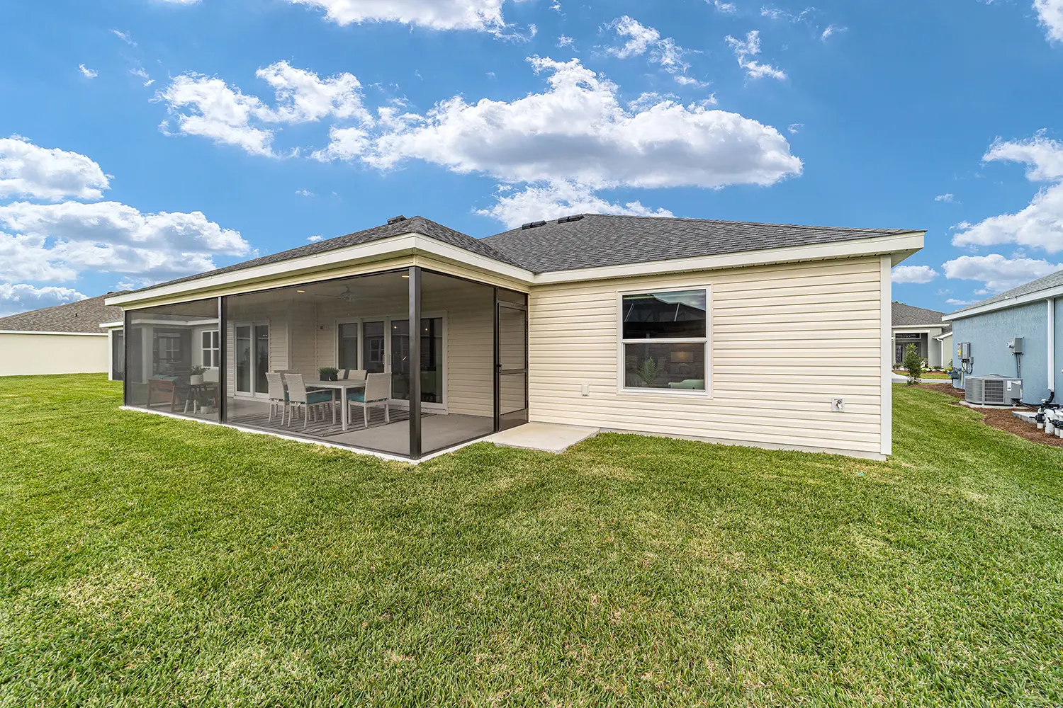 designer-whispering-pine-street-of-dreams-exterior-rear-lanai-2