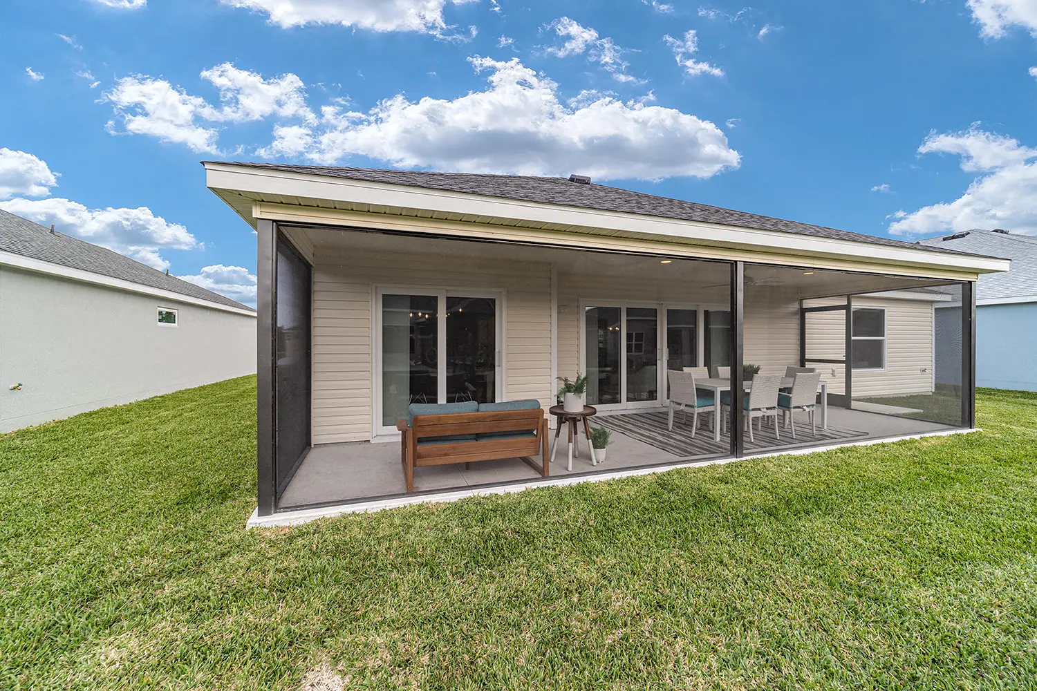 designer-whispering-pine-street-of-dreams-exterior-rear-lanai