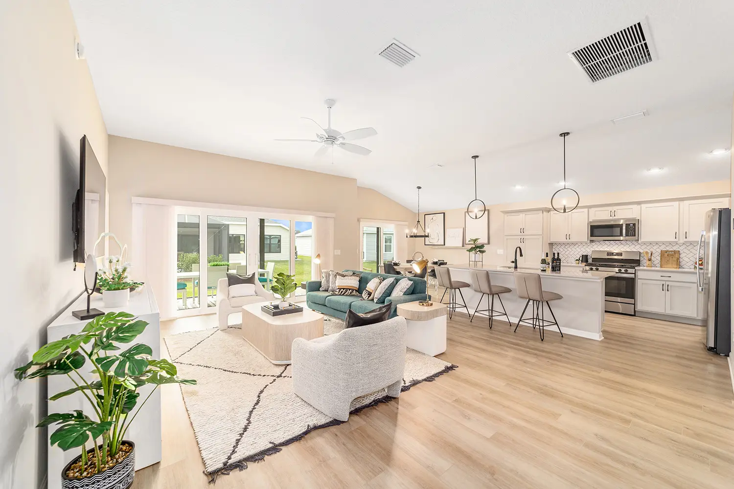 designer-whispering-pine-street-of-dreams-living-room-kitchen-2