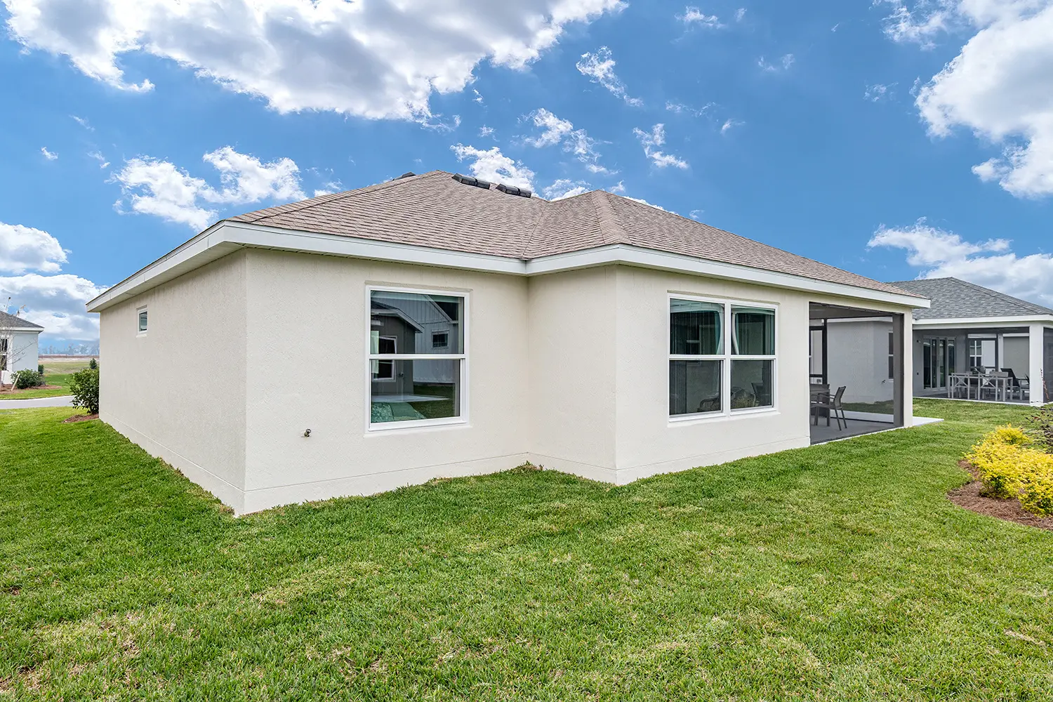 designer-anhinga-street-of-dreams-exterior-rear-lanai