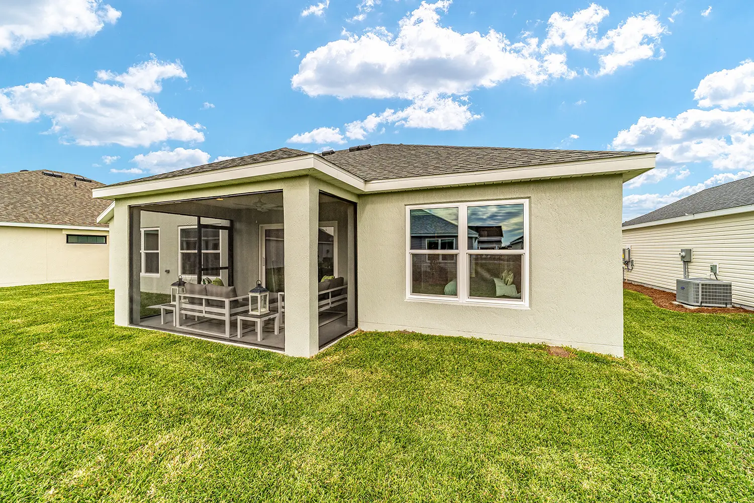 designer-chickadee-street-of-dreams-exterior-rear-lanai-1