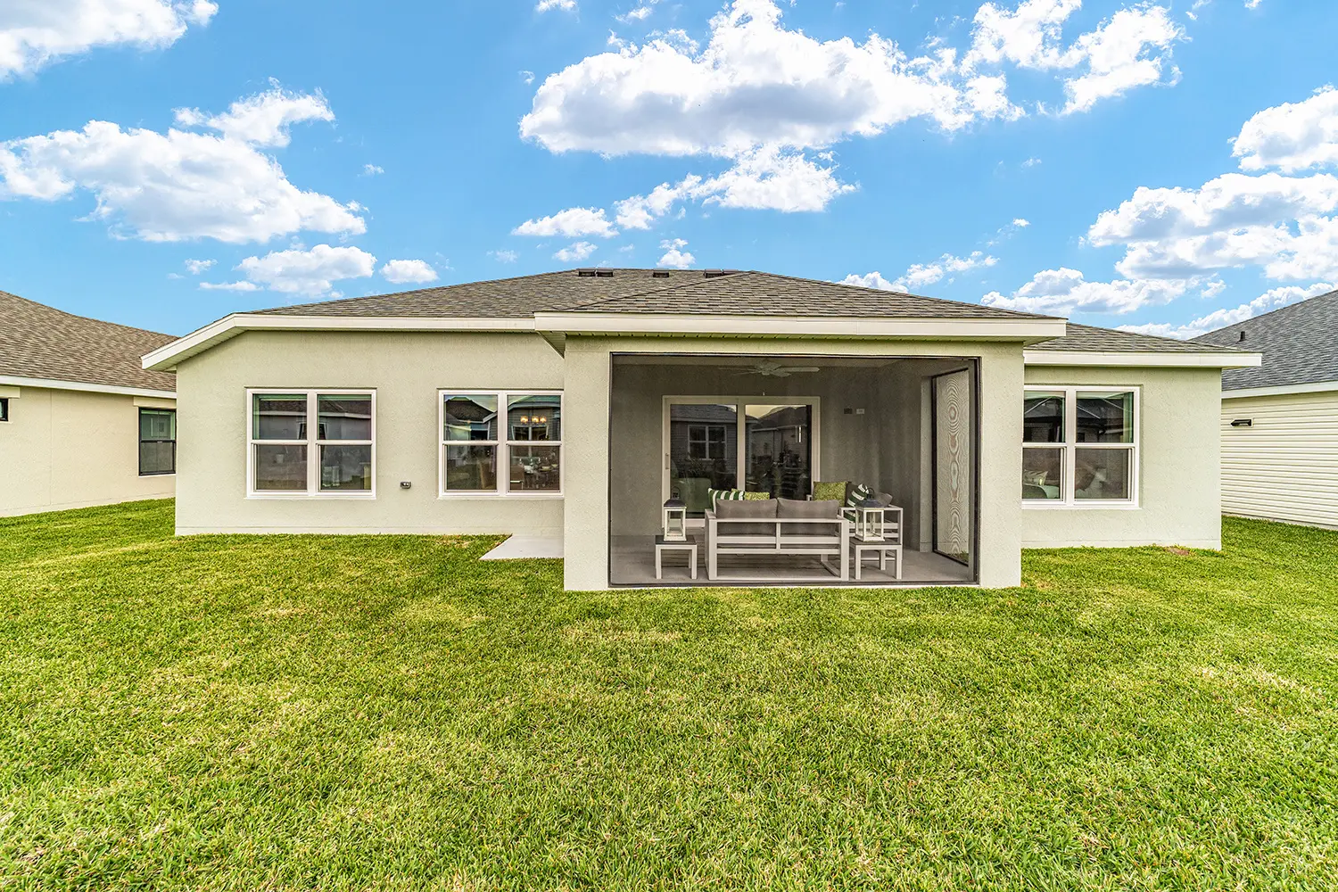 designer-chickadee-street-of-dreams-exterior-rear-lanai-2