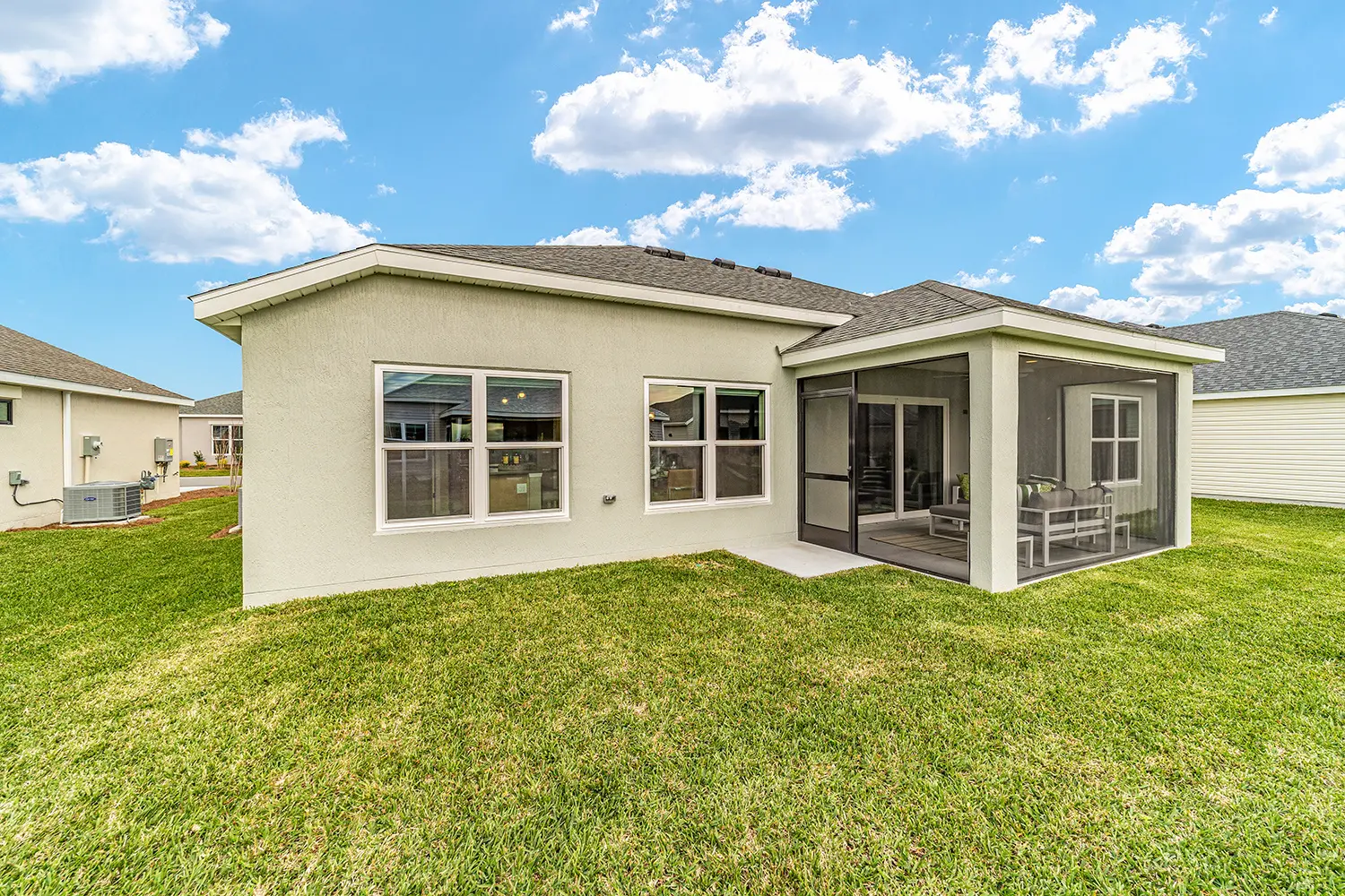 designer-chickadee-street-of-dreams-exterior-rear-lanai