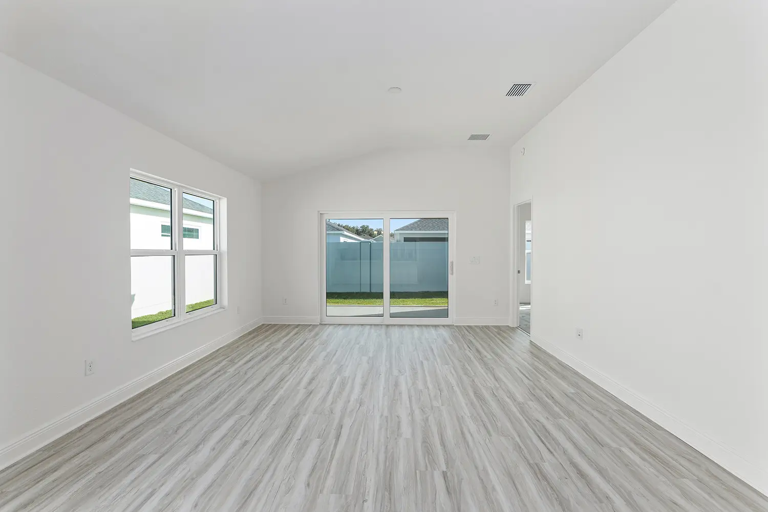 courtyard-villa-durham-living-room-glass-doors-8