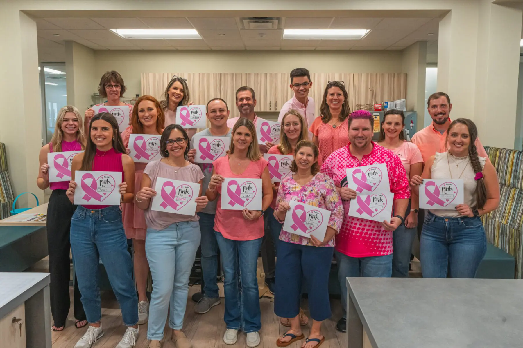 Marketing team in pink for Breast Cancer Awareness. October 2023